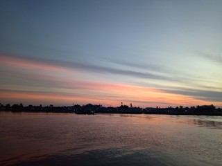 Wall Mural - the sky when the sun will rise in the river