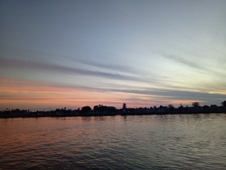 Wall Mural - the sky when the sun will rise in the river