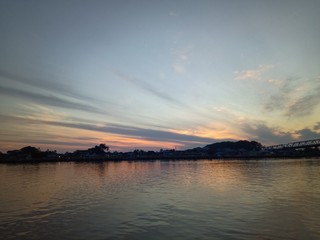 Wall Mural - the sky when the sun will rise in the river