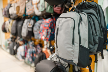 Wall Mural - Showcase with backpacks in sports shop, nobody