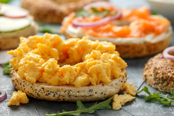 Wall Mural - Healthy Bagels breakfast sandwich with scrambled eggs, salmon and cream cheese