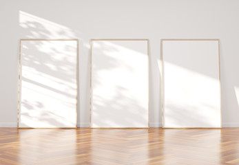 Wall Mural - Three wooden frame leaning in wooden interior mockup 3D rendering