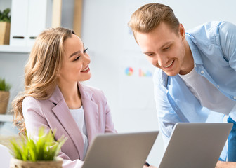 Canvas Print - man and woman working in the office