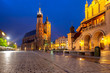 Krakow. Market square in the night lights at sunrise.