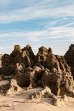 Fototapeta  - Afloramento rochoso numa praia, que forma este monumento natural de pedra na Costa Vicentina em Porto Covo, Portugal, Europa.
