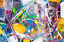 Disposable Single Use Plastic Objects Such As Bottles, Cups, Forks, Spoons And Drinking Straws That Cause Pollution Of The Environment, Especially Oceans. Top View.
