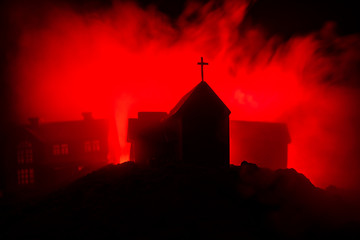 Wall Mural - old house with a ghost in the forest at night or abandoned haunted horror house in fog. old mystic b