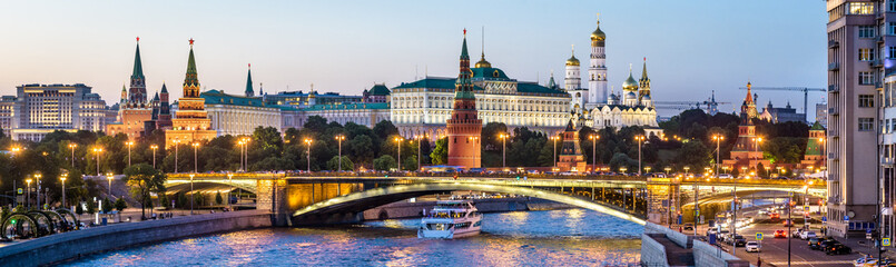Wall Mural - Moscow Kremlin at night, Russia. Panoramic view of city. Cityscape with Moskva River in evening.