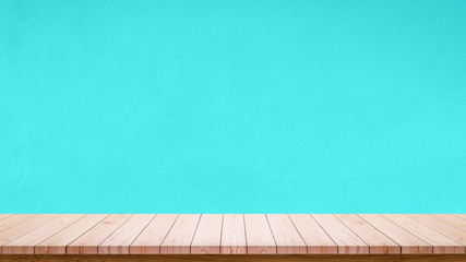 Poster - Empty wooden table with sky blue wall background.