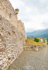 Wall Mural - Assergi (Abruzzo, Italy) - A small charming medieval village surrounded by stone walls, in the municipality of L'Aquila, under the Gran Sasso mountain, now abandoned after the earthquake