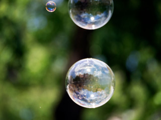 Abstract background with soap bubbles, close up, with reflection