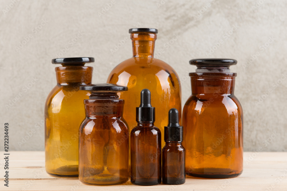 Retro pharmacy - vintage pharmacy bottles on wooden board