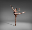 © Yevgeniy - Beautiful flexible ballerina dancing in studio