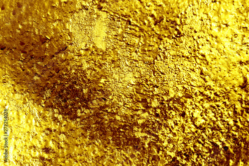 Texture Of A Surface Of A Golden Nugget Close Up For A Background