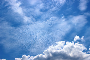 Spindrift white clouds with heaven background and nature blue sky