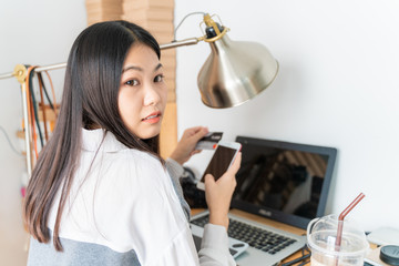 Busines entrepreneur women use laptop computer in shop