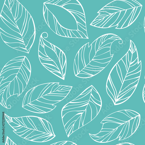 Seamless pattern from the leaves. Openwork leaves on a green background.