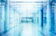 © malija - abstract defocused blurred technology space background, empty business corridor or shopping mall. Medical and hospital corridor defocused background with modern laboratory (clinic)