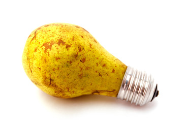 Light bulb made from green pear isloated on white background. Renewable energy concept. Alternative lamp.