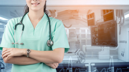 Doctor with a stethoscope in the hands and Operating room background, Modern medical technology and innovation concept