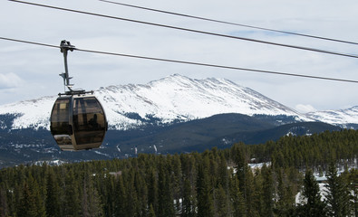 gondola with mountains in the background