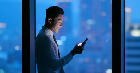 Poster - man use smartphone at night