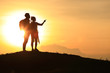 © CStock - The silhouette of a lover, holding hands on the hills,