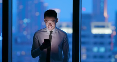 Poster - man use smartphone at night