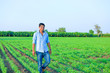 © PRASANNAPIX - Young indian farmer at field