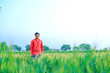 © PRASANNAPIX - Young indian farmer at field