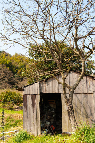 農具を収納する小屋と樹木 Stock Photo Adobe Stock