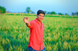 © PRASANNAPIX - Young indian farmer at field