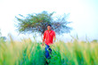 © PRASANNAPIX - Young indian farmer at field