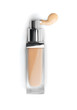 © Subbotina Anna - Foundation face makeup. Cosmetic liquid foundation or bb cream in bottle. Beige smudge smear strokes isolated on white