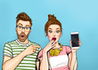 © lucky1984 - Attractive amazed young man pointing finger on mobile phone in hand wow girl in comic style. Pop art woman holding smartphone. Digital advertisement couple showing the message or new app on cellphone