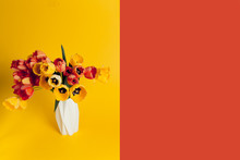 A Bouquet Of Red And Yellow Flowers, Tulip Flowers In A White Bowl. 