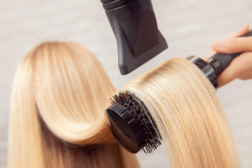 Poster - Close-up of hair dryer, concept cut salon, female stylist