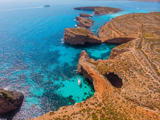 Wall Mural - Panorama of Blue Lagoon Comino Malta. Cote Azur, turquoise clear water with white sand. Aerial view