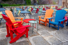 Beautiful Multi Colored Bright Wooden Outdoor Furniture Chairs And Tables Outside  Orange, Blue, Red