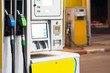 Gasoline station gas fuel pump. Petrol pump in gas station. Gas station in a service. Gas pump nozzles in a station.