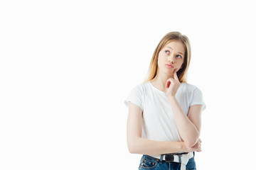 Wall Mural - dreamy teenage girl looking away isolated on white