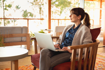 Poster - Woman working on a laptop