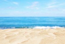 Empty Sand Beach In Front Of Summer Sea Background With Copy Space