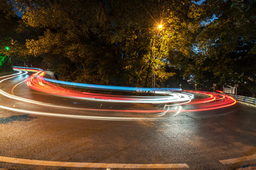 Poster - Abstract image of blur motion of car on forest road at night