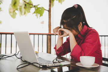 Business analysis concept. Businesswoman analyzing business documents, finacial report, working on laptop computer, mobile smart phone on office desk, close up.