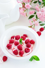 Wall Mural - Creamy curd mousse with raspberries. Healthy breakfast.