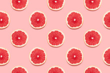 Grapefruit Slices Tropical Seamless Pattern On Pink Background Minimal Summer Concept. Flat Lay, Trendy Juicy Color.