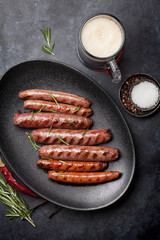 Wall Mural - Grilled sausages and beer