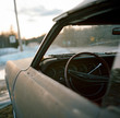 © Jakob Lagerstedt/Stocksy - View of the driver side of an abandoned car by the side of the road