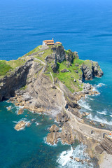 Wall Mural - sunny day at gaztelugatxe island, located at basque country coastline